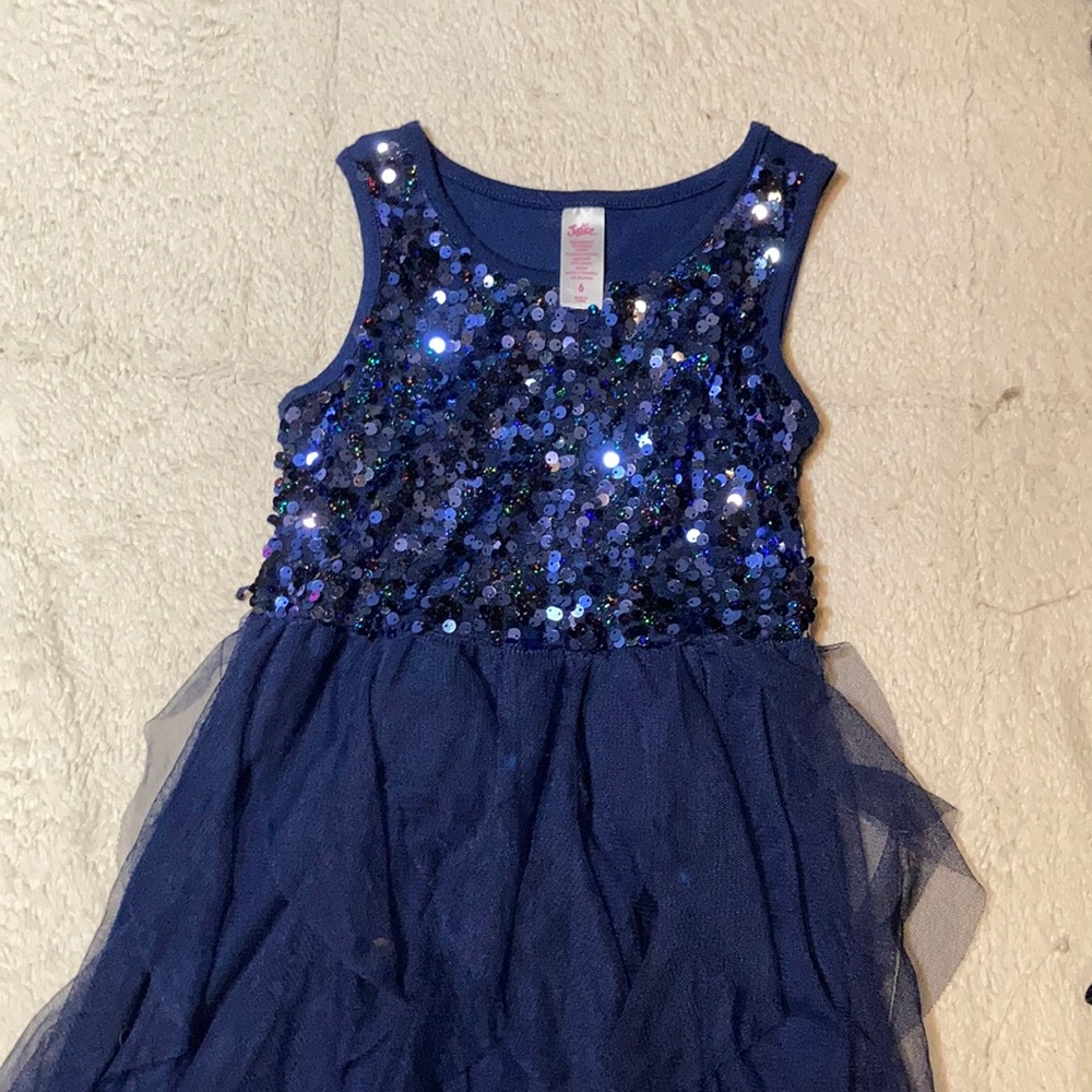 This is a navy blue justice dress